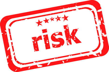 risk red rubber stamp over a white backgroundの写真素材