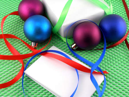 Christmas balls, white gift box and white invitation card
