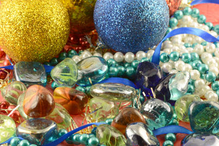 Elegant pearls (diamonds) and stones with blue ribbonsの写真素材