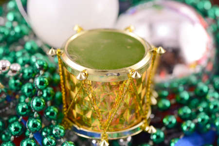 Christmas decorations, new year invitation card, drums, pearls and xmas ballsの写真素材