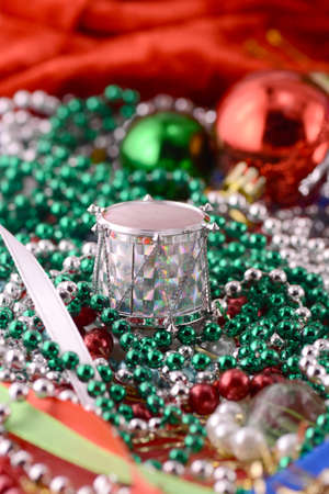 Christmas decorations, new year invitation card, drums, pearls and xmas ballsの写真素材