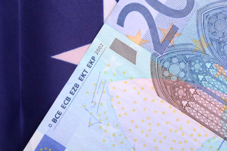 european money on american flagの写真素材