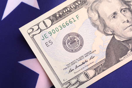 dollars on american flagの写真素材