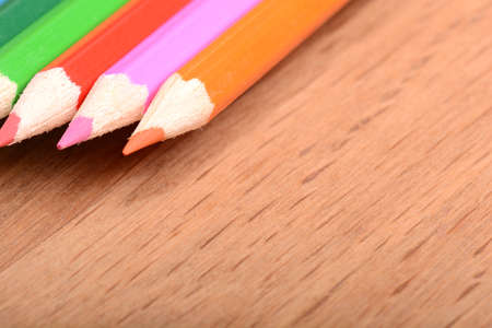 colored pencils  on wooden backgroundの写真素材