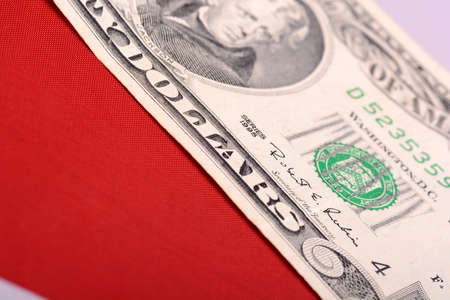 american dollars on american flagの写真素材