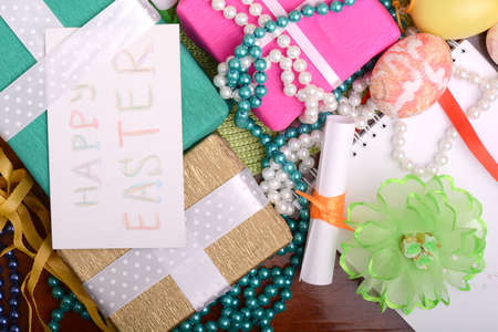 Easter background with eggs, ribbons and spring decoration