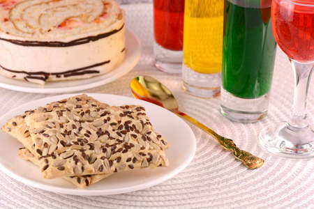 sweet cake on white plate and juice