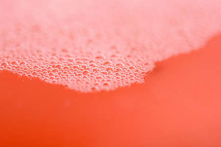 red water drops close upの写真素材