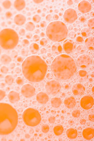orange water drops close upの写真素材