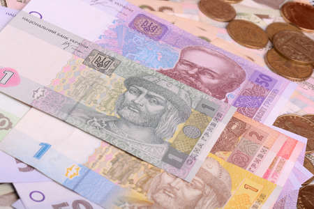 Pile of Ukrainian money, isolated on white