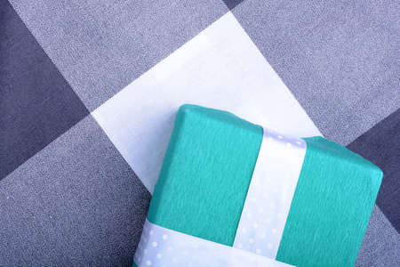 holiday Green gift box with white ribbon