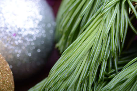 Closeup of beautiful Christmas baubles, Decorated christmas tree, holiday background, green tree eve...