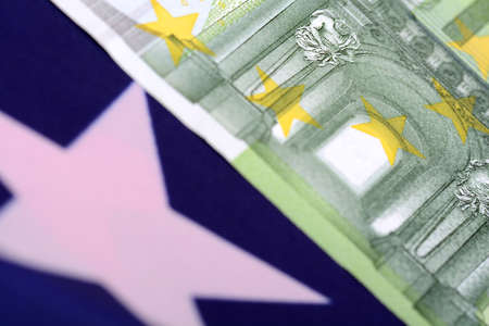 european money on american flagの写真素材
