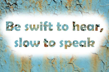 Be swift to hear, slow to speak. words print on the grunge metallic wallの写真素材