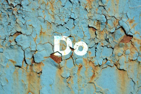 do word print on the green rusty metal painted background, grunge texture.の写真素材