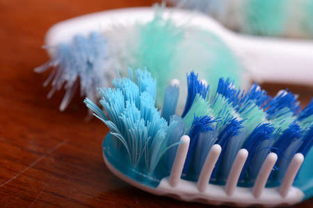 xtreme Macro close up of toothbrush with wooden background