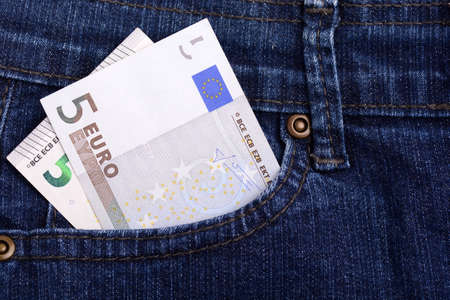 Euro notes in jeans pocket. European money. Jeans texture. Business concept