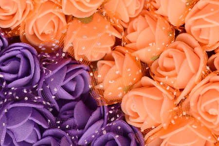 Flowers composition. Frame made of artificial flowers backgroundの写真素材