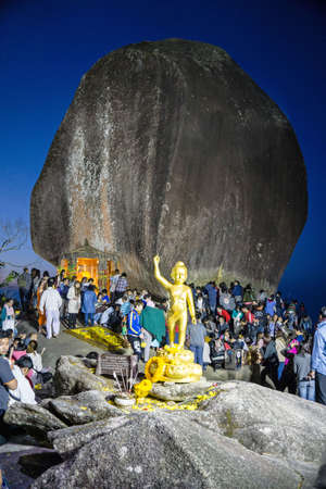 Chantaburi, Thailand - January 20, 2015 : People is worshiping the big rock. Because, They believed that this rock have the footprint of buddha.のeditorial素材