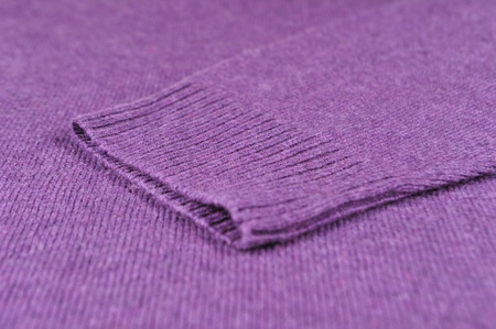Closeup of purple wool sweater の写真素材