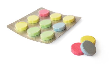 Colorful pills isolated on white