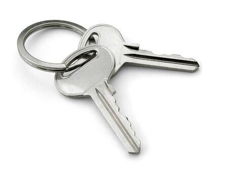 Two keys on a keyring isolated on white
