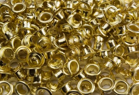 Brass eyelets isolated on whiteの写真素材
