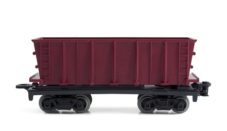 Toy plastic open freight car isolated on white