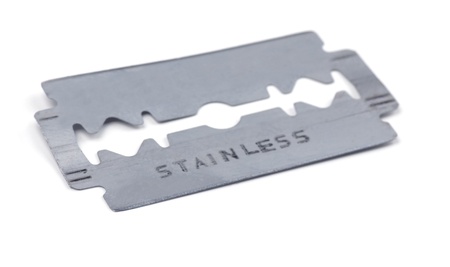 Old razor blade isolated on white 