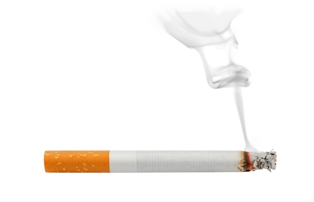 Smoking and burning cigarette isolated on whiteの写真素材