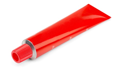 Red tube of ointment isolated on white