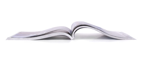 Panoramic shot of open magazine isolated on white