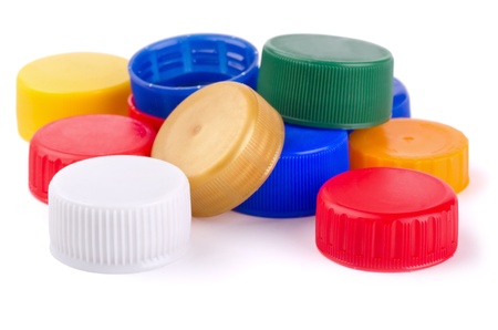 Plastic bottle screw caps isolated on whiteの写真素材