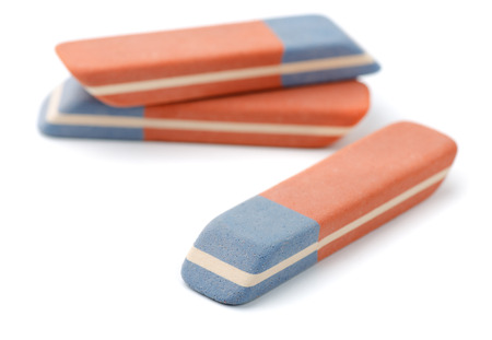 Group of three new erasers isolated on white