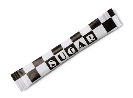 Small paper sugar pack isolated on whiteの写真素材