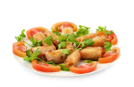 Plate of fried seafood spring rolls isolated on white