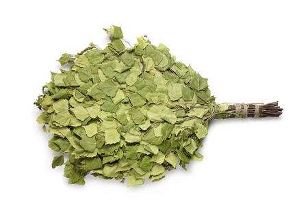 Birch sauna broom isolated on whiteの写真素材