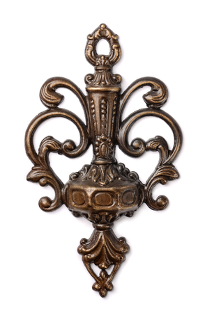 Antique bronze decoration isolated on whiteの写真素材