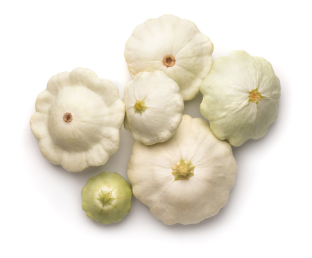 Top view of ripe white pattypan squashes isolated on whiteの写真素材