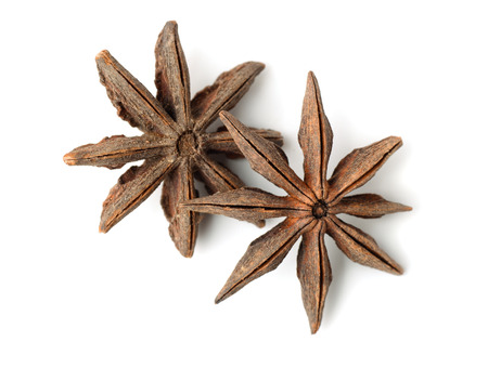 Top view of star anise fruits isolated on whiteの写真素材