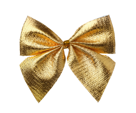 Front view of decorative golden bow isolated on whiteの写真素材