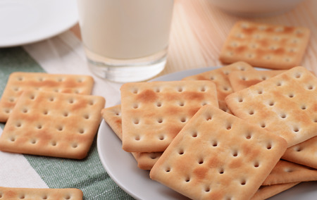 Still life with soda crackers and  milkの写真素材