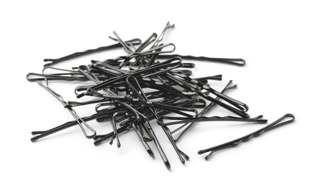 Group of black metal  hairpins isolated on whiteの写真素材