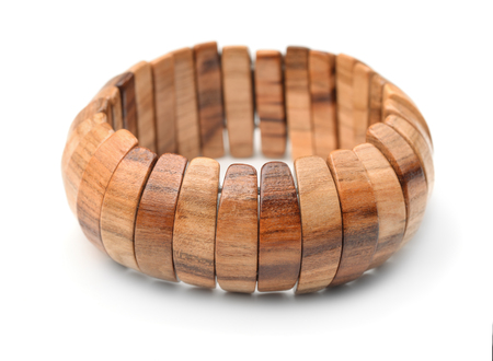 Wooden bracelet isolated on whiteの写真素材