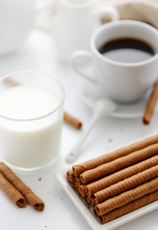 Still life with wafer rolls and milkの写真素材