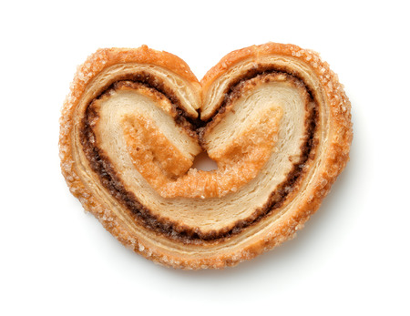 Top view of cinnamon sugar palmiers cookie isolated on whiteの写真素材