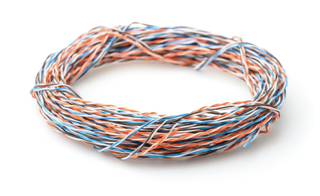 Rolled twisted pair cable isolated on whiteの写真素材