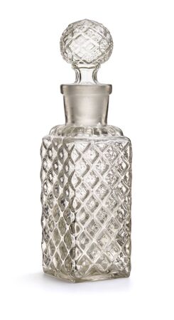 Vintage glass cosmetic bottle isolated on whiteの写真素材