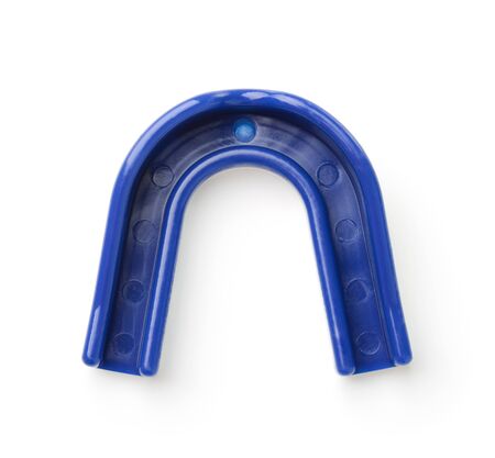 Top view of blue silicone sport mouth guard isolated on whiteの写真素材