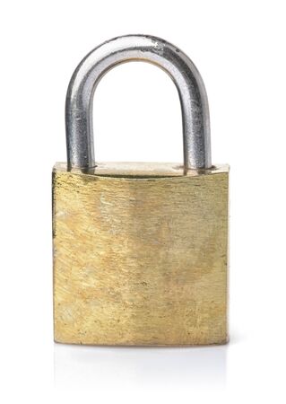 Front view old brass padlock isolated on whiteの写真素材